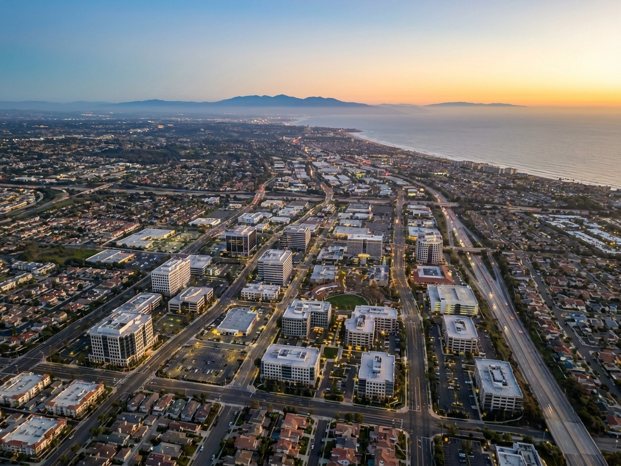 Panoramic aerial view of Orange County skyline at golden hour