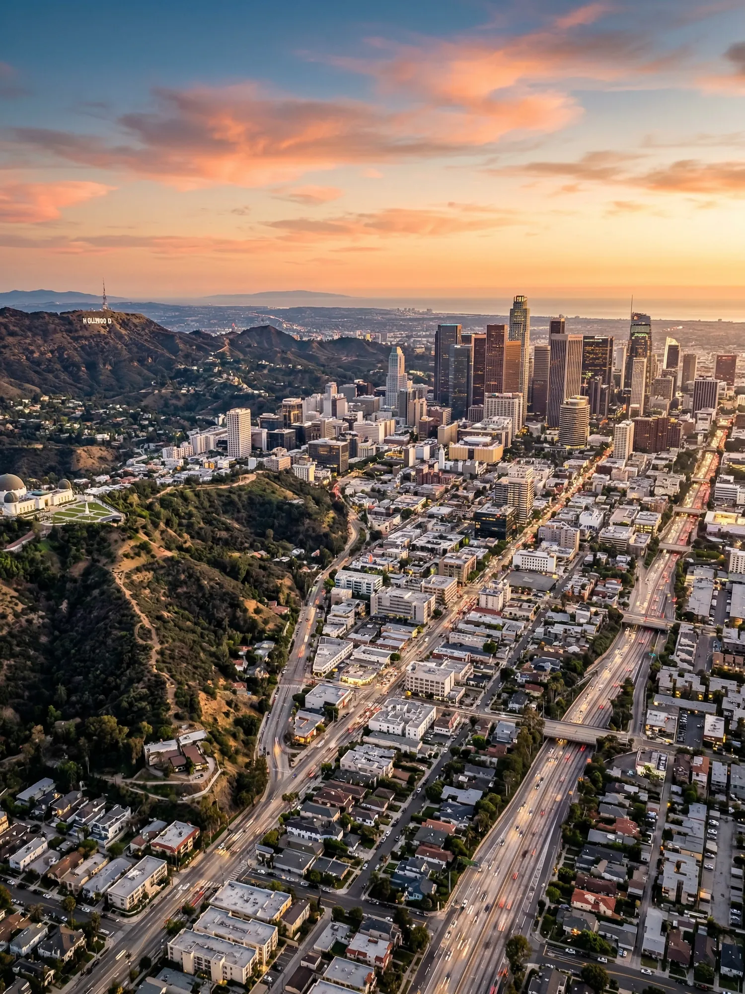 Panoramic aerial view of Los Angeles skyline at golden hour