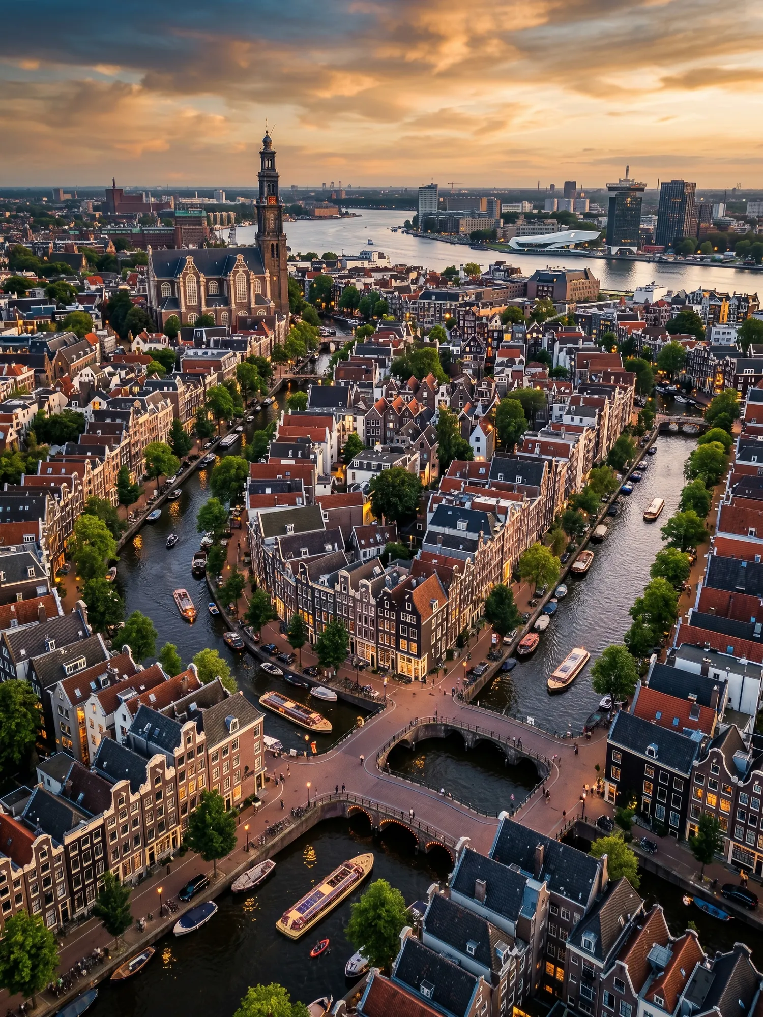 Panoramic aerial view of Amsterdam skyline at golden hour