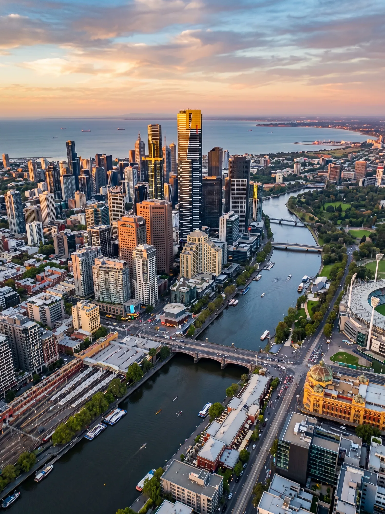 Panoramic aerial view of Melbourne skyline at golden hour