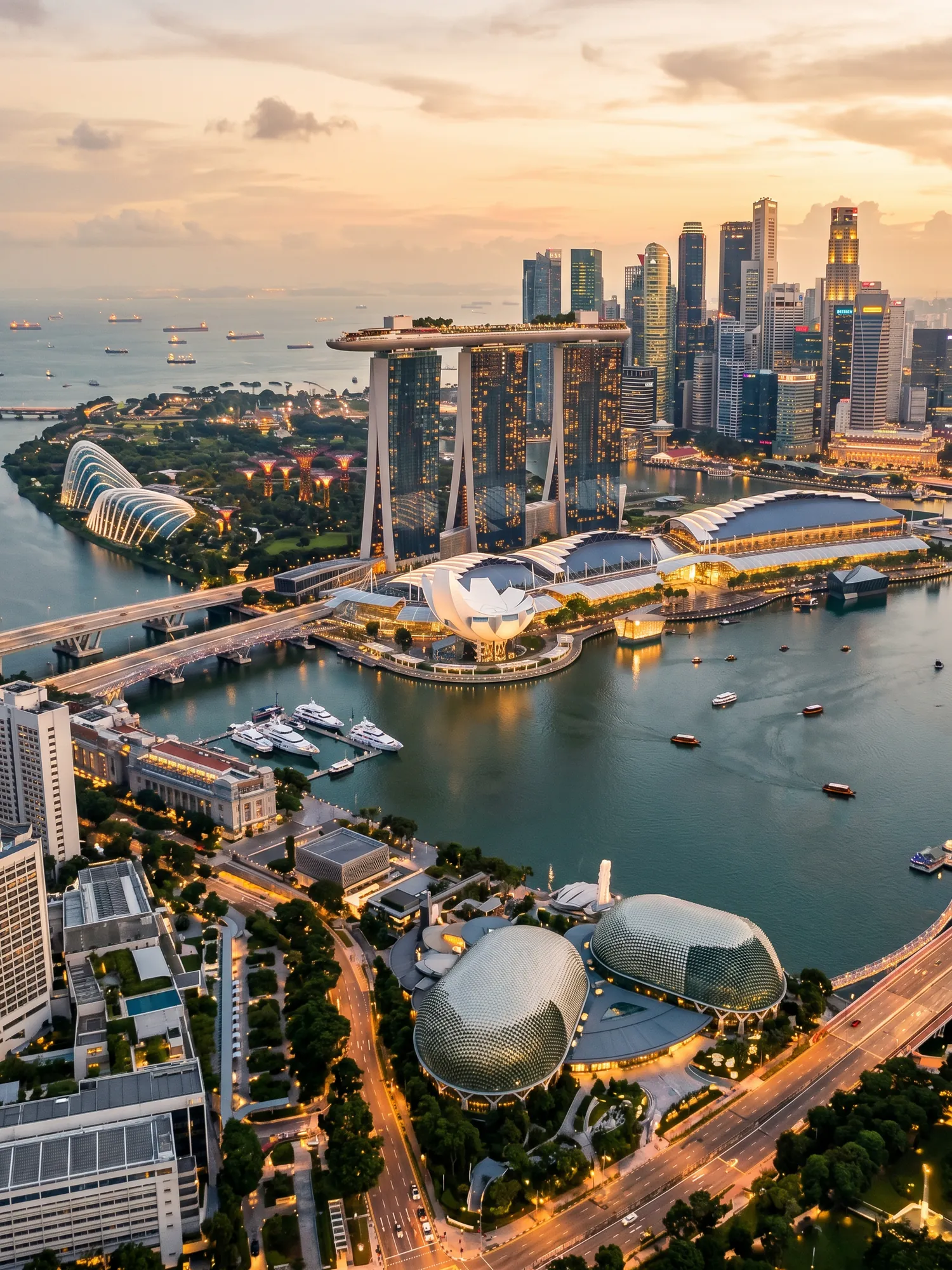 Panoramic aerial view of Singapore skyline at golden hour