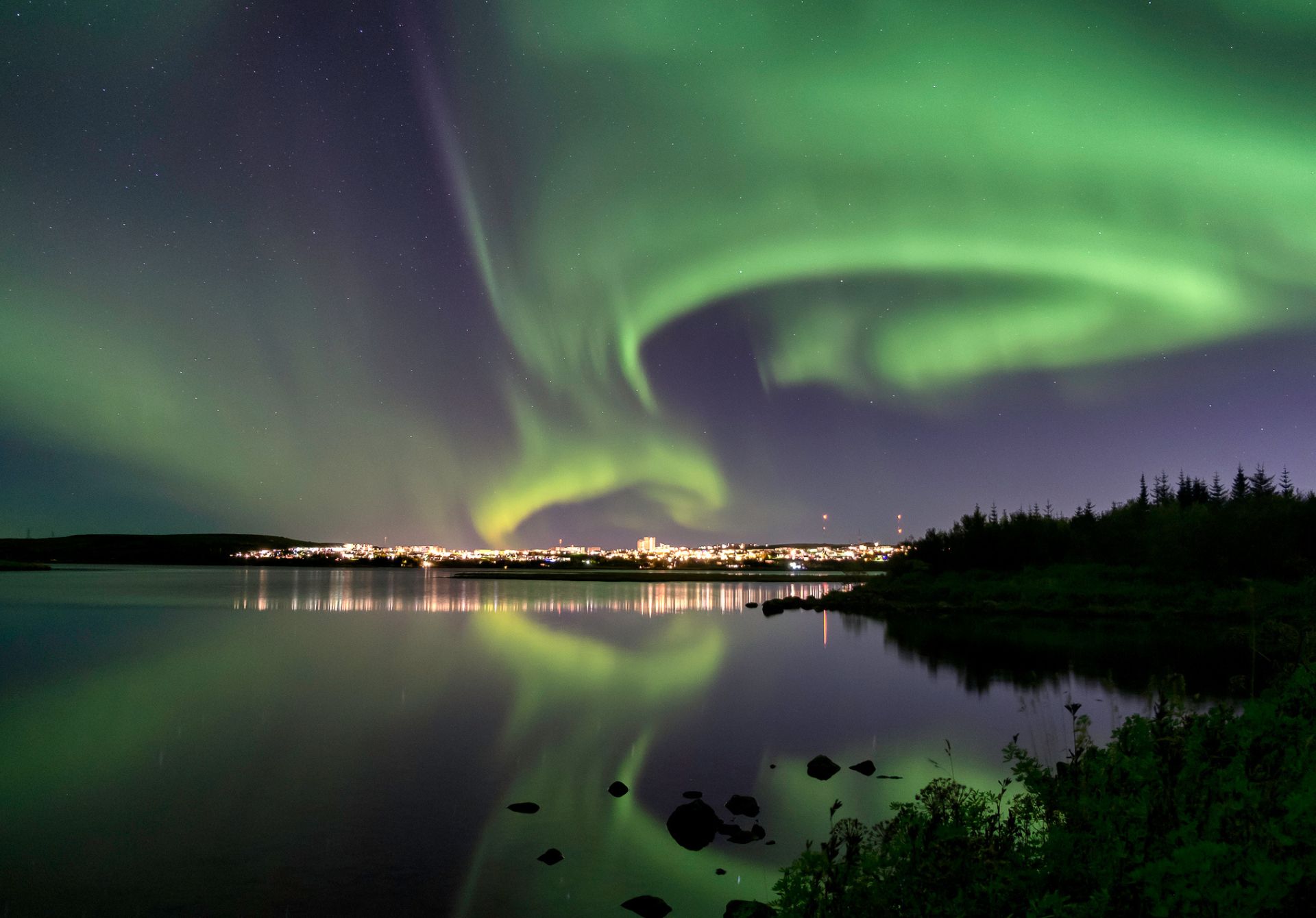 Image of Aurora Over Reykjavik City