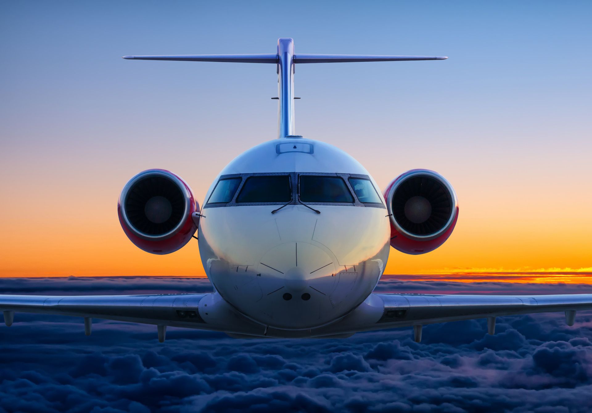 Image of Private Jet Above The Clouds