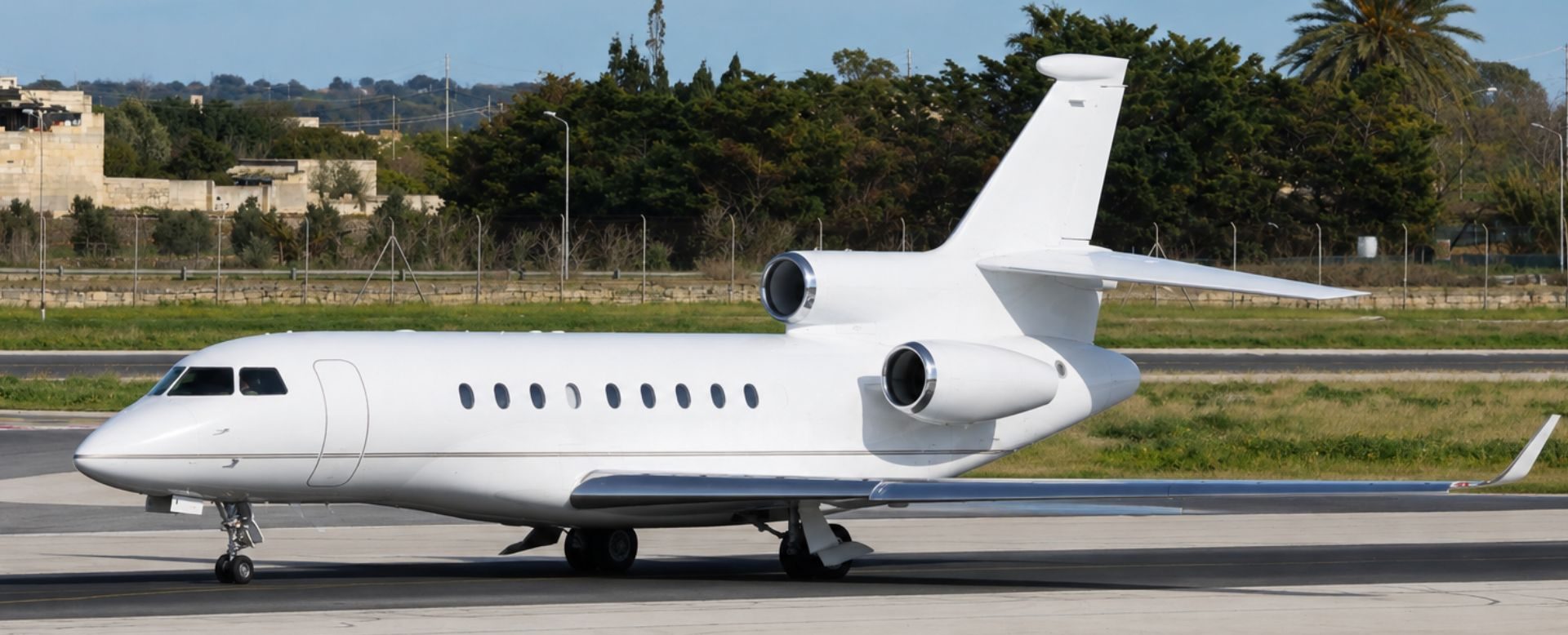 Private jet taxiing at an airport