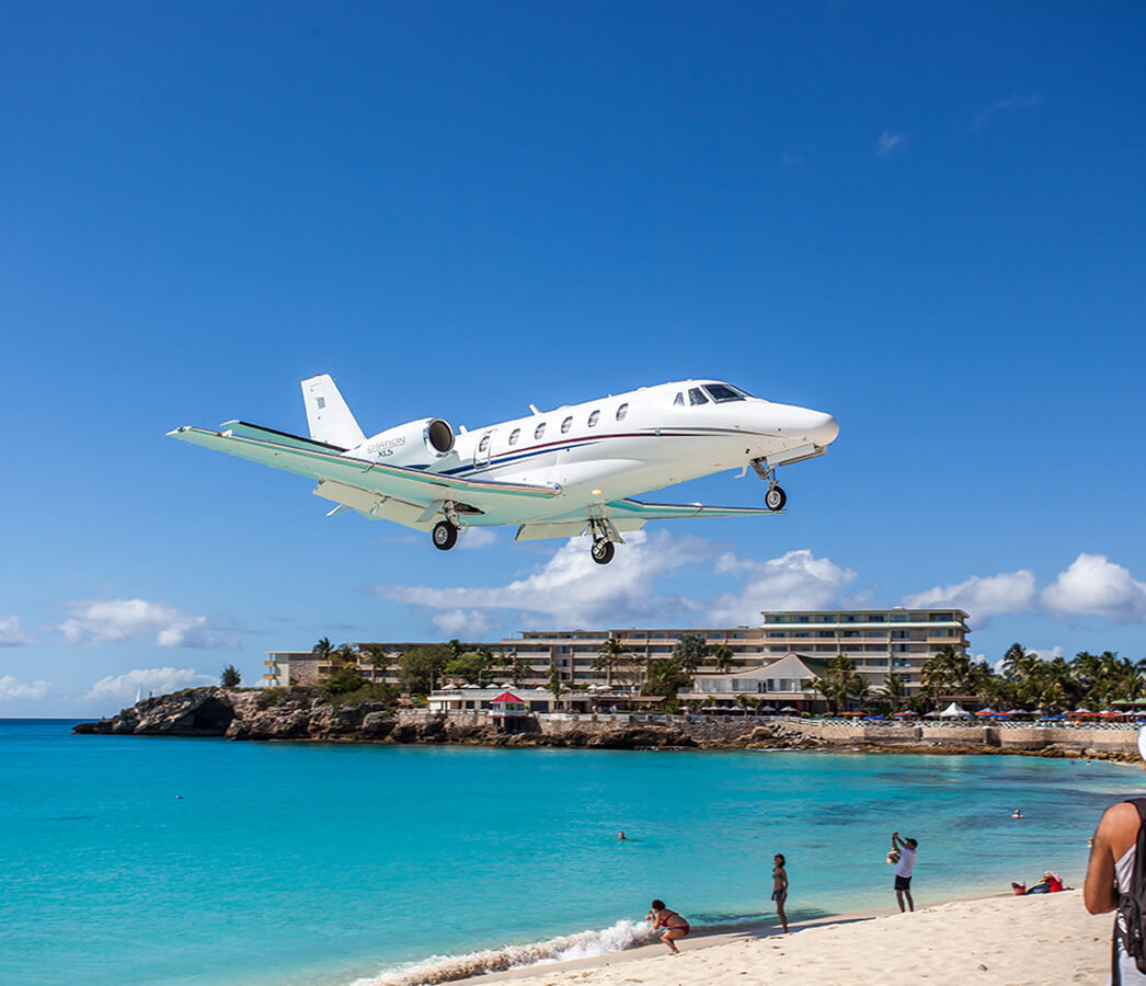 Jet flying over the beach